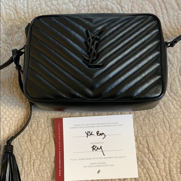 Yves Saint Laurent Handbags - EUC YSL Black leather with Black Logo camera bag